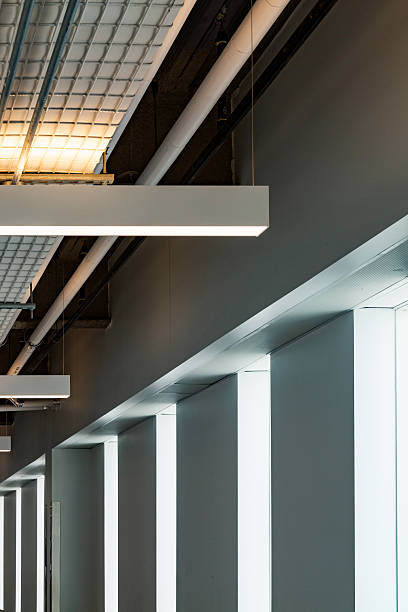 Modern Industrial Ceiling Design with Sleek Lighting and Abstract Architecture