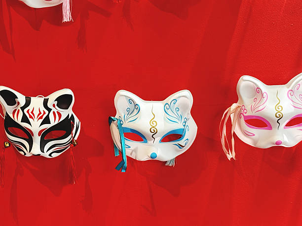 istock Carnival masks on a red background, close-up. 2211358691