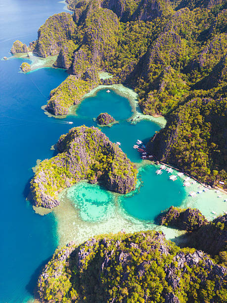istock Aerial view of Twin Lagoon turquoise waters with a drone The Philippines Coron 2211360607