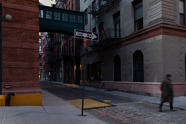 Person walking at dusk in Tribeca New York City