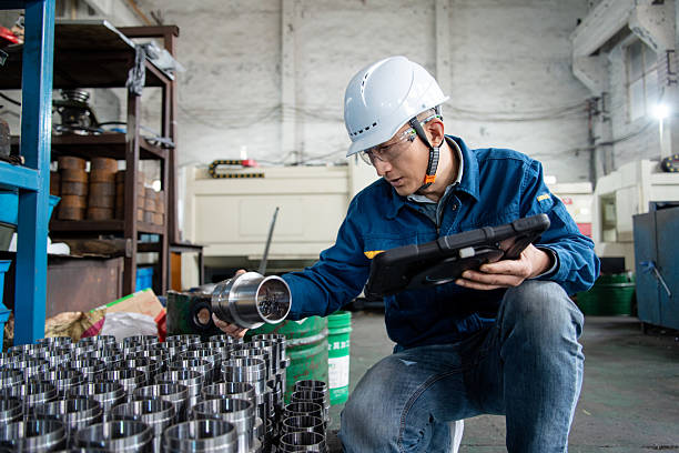 istock asian male engineer working in factroy 2211363976