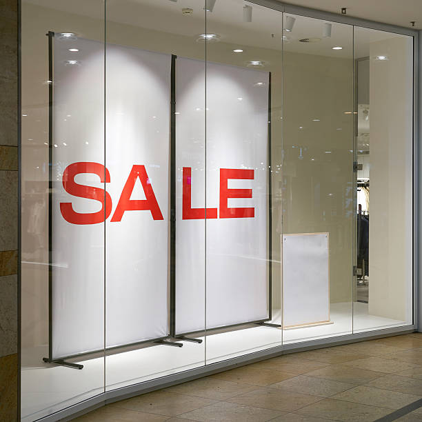 istock shop window with the lettering Sale 2211364357