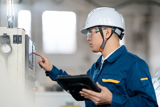 istock asian male engineer working with digital tablet in factory 2211364522