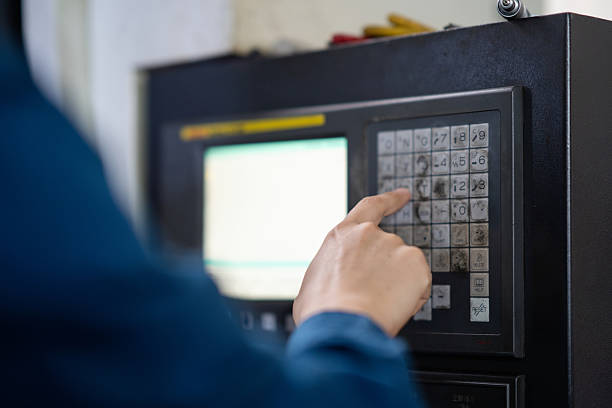 istock Engineer use milling machine,Examining the metal in factory 2211364895