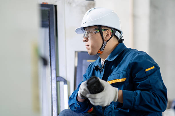 istock Engineer use milling machine,Examining the metal in factory 2211364991