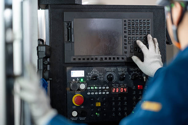 istock Engineer use milling machine,Examining the metal in factory 2211365132