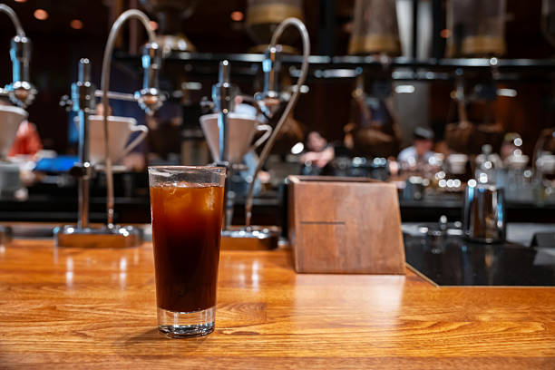 istock Ice Americano in grass by coffee machine, Shanghai, China 2211366829