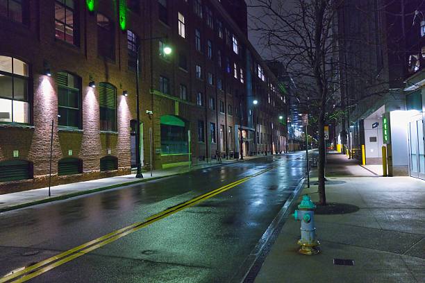 istock rainy street at night 2211367110