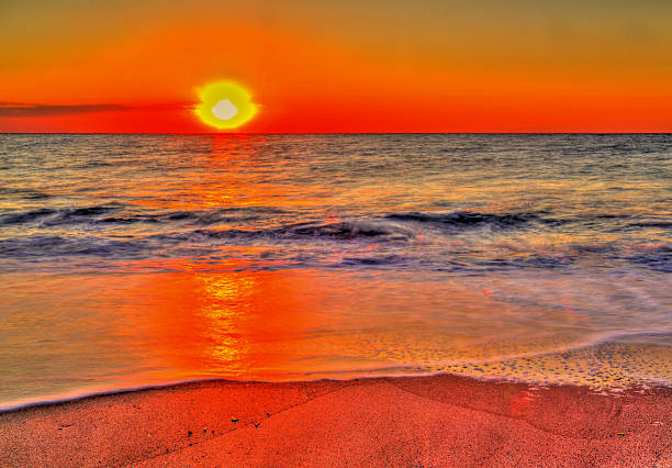 istock Beautiful summer sunrise over the beach 2211371354