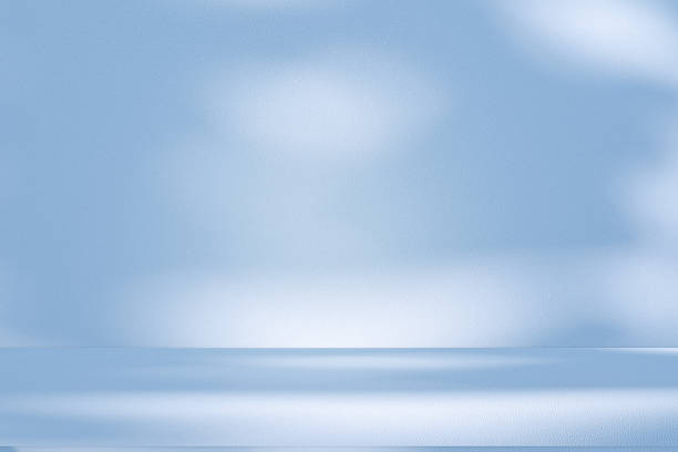 istock Studio style background wall decoration presentation uses white and blue tones. with shadows cast from a nearby window, concept creating a decorative 2211372001