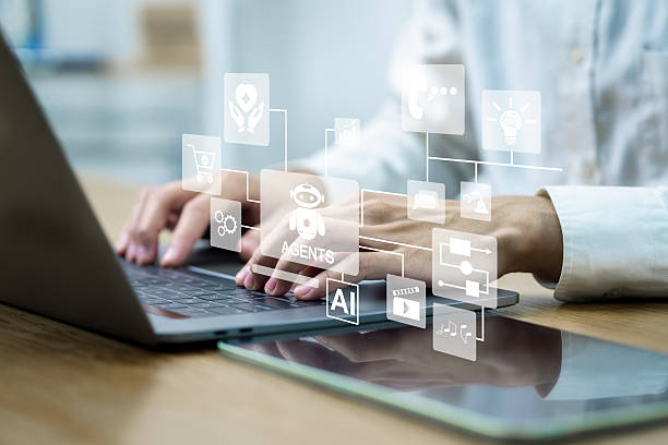 istock AI Agents Business people use computers that interact with AI to help with tasks such as analysis, content creation, video creation, complex thinking, calculations, etc. 2211377439