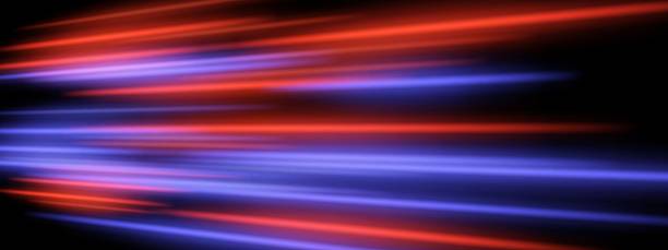 istock Blurred speed lights. Red and purple lines with wide motion blur create layered horizontal movement effect. 2211379109