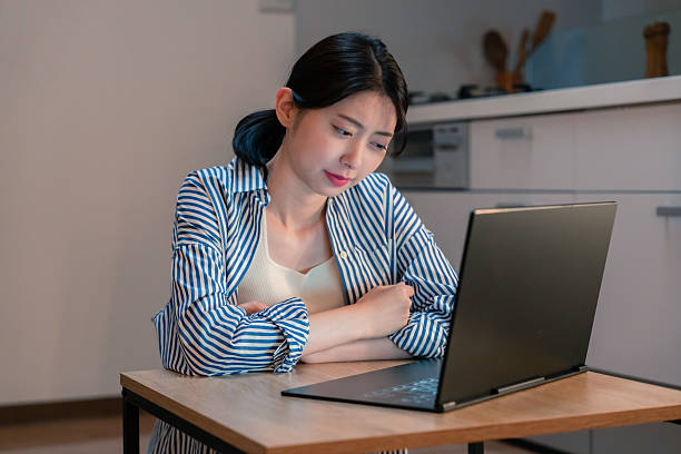 istock Young woman fatigued from long telecommuting hours 2211379273