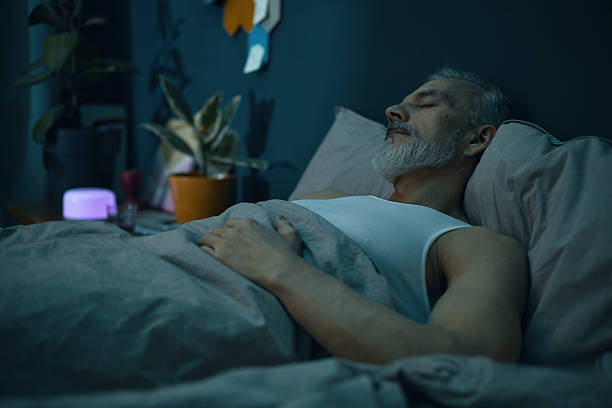 Sleeping Senior Man Resting Peacefully in Bedroom