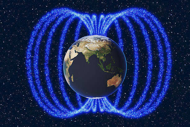 istock The planet Earth’s magnetic field is visualized by glowing particles in outer space. Illustration of the concept of geomagnetic field and reversals of polarity 2211391893