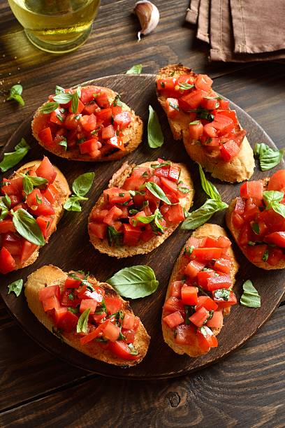 istock Delicious bruschetta with with cherry tomatoes and basil 2211392202