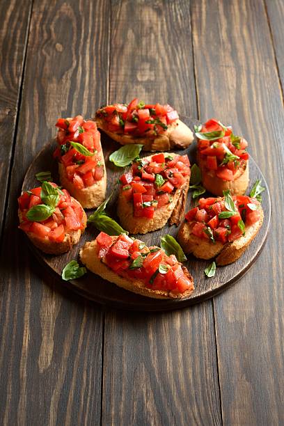 istock Bruschetta with with cherry tomatoes and basil 2211392206