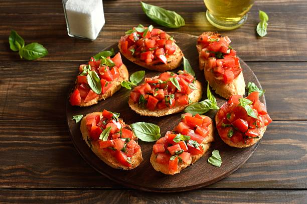 istock Bruschetta with with cherry tomatoes and basil 2211392215