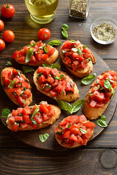 istock Bruschetta with with cherry tomatoes and basil 2211392260