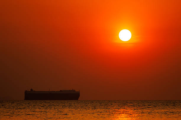 Catamaran of Bali / Indonesian fisherman at sunrise are coming home. They fishing in the night.
