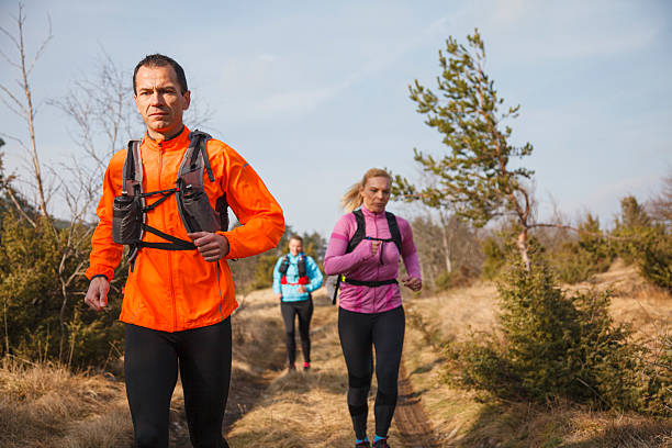 istock Group of Trail Runners Training in Nature 2211393484