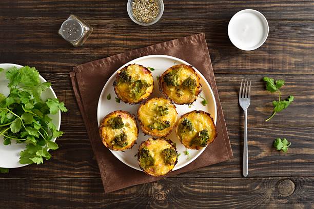istock Healthy loaded egg muffins made with eggs, ham, broccoli, cheese 2211394288