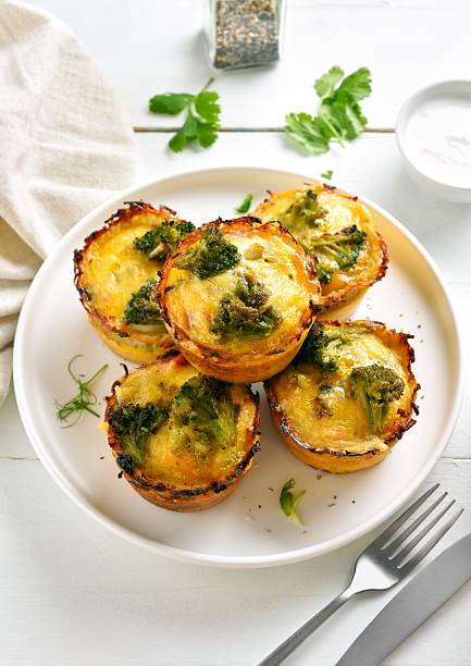 istock Healthy loaded egg muffins made with eggs, ham, broccoli, cheese 2211395165