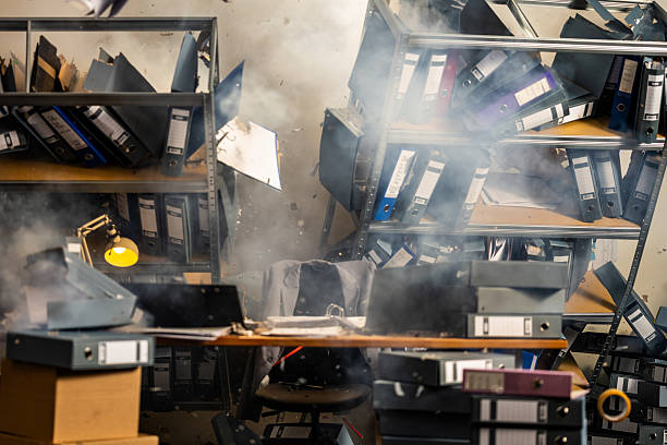 istock Office Archive Collapse with Flying Folders and Smoke 2211398050