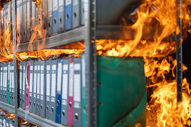istock Side View of Archive Shelves Burning in Flames 2211398121