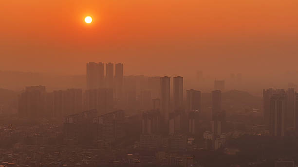 istock City toxic smog. Air pollution urban environment. Dirty smoke ecology problem. 2211399249