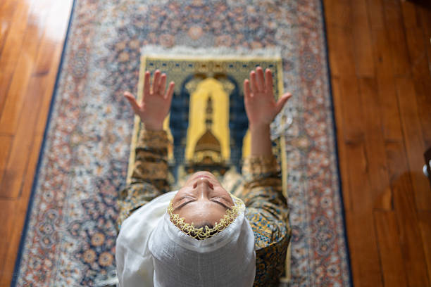 group of muslim people praying namaz  in mosque worship Allah top view