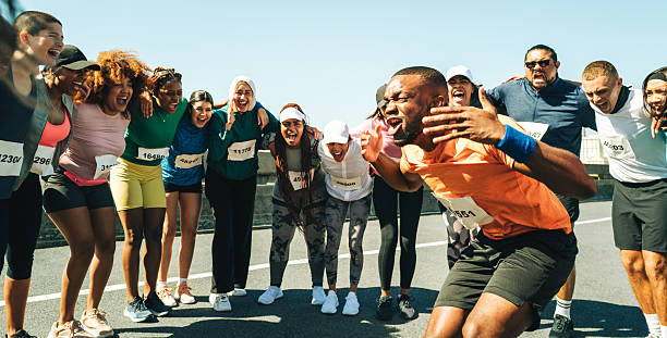 istock Diverse group of runners preparing for exciting race event 2211404908