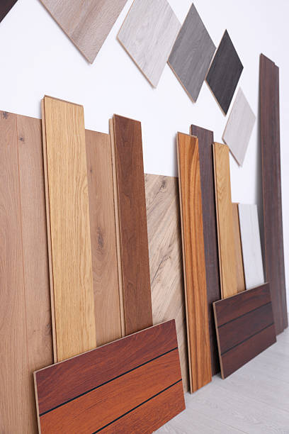 istock Many different samples of wooden flooring on light background 2211408347