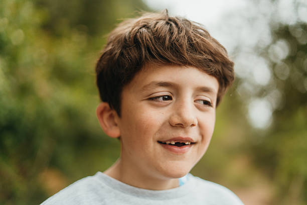 istock Portrait of boy smiling 2211412689