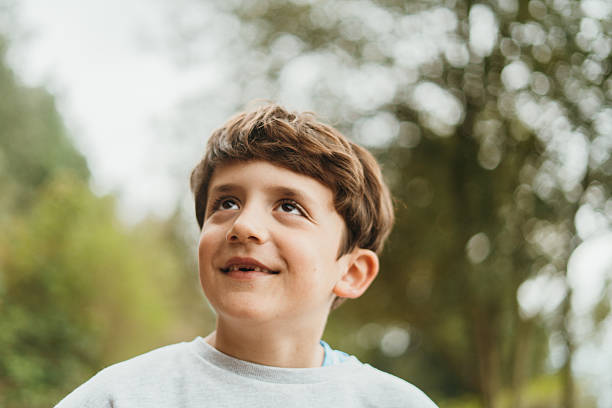 istock Portrait of boy smiling 2211412690