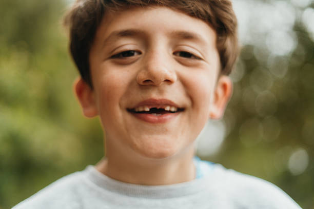 istock Portrait of boy smiling 2211412714
