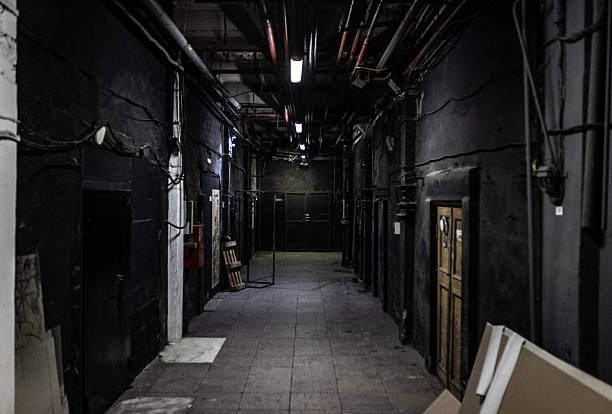 istock Dimly lit industrial corridor with an ominous atmosphere 2211414510
