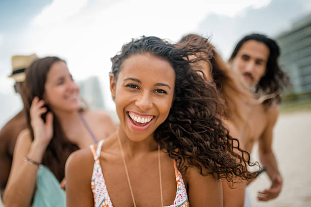 istock happiness friends all together at the beach 2211416285