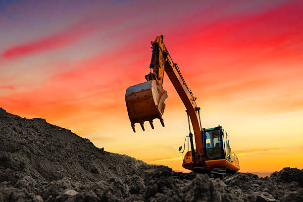 istock Coal mining in an open-pit. Excavator on Coal mining. Excavator digging in open pit coal mine. 2211418970