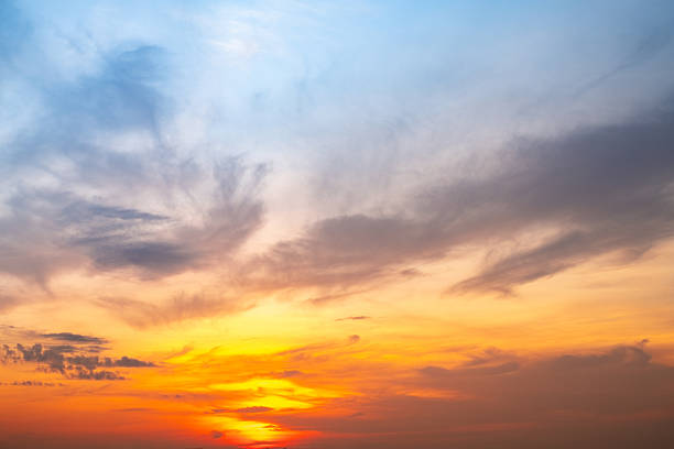 istock Beautiful , luxury soft gradient orange gold clouds and sunlight on the blue sky perfect for the background, take in evening,Twilight, Large size, high definition landscape photo 2211423353