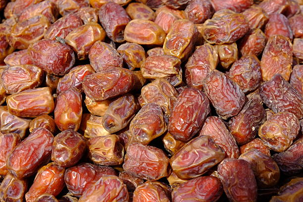 istock Bulk mabroom dates at the market stall. 2211423665