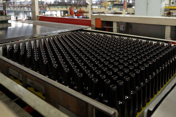 Glass bottles on automated production flow machines
