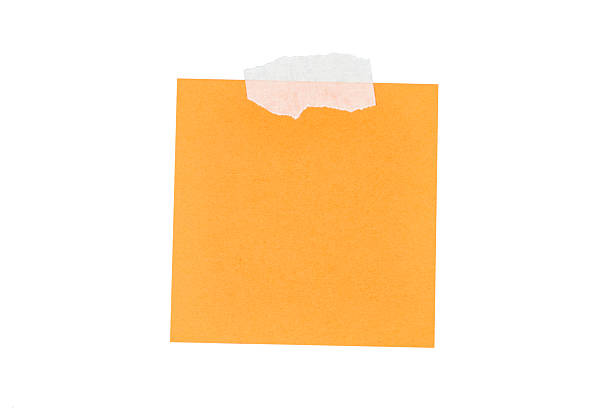 istock orange sticky note with duct tape isolated on white 2211435028