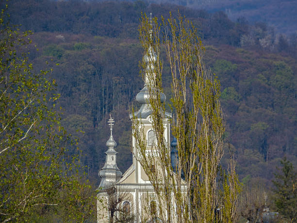 istock Spring landscape with rural church in mountains 2211437704