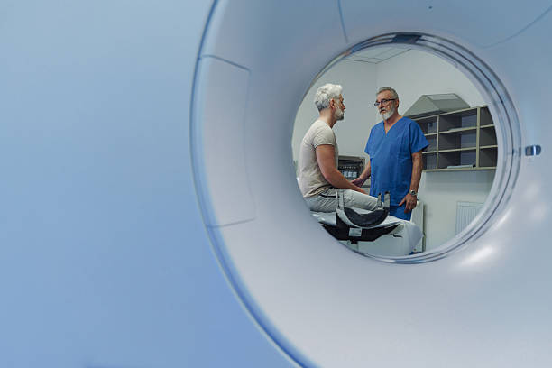 istock Doctor explaining CT scan results to patient in hospital setting 2211437705