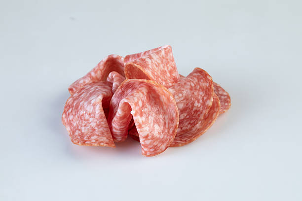 istock Bologna Salami isolated nature background with clipping path 2211438412
