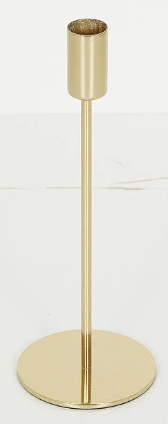 istock Golden candlesticks are arranged horizontally isolated nature background with clipping path 2211443057
