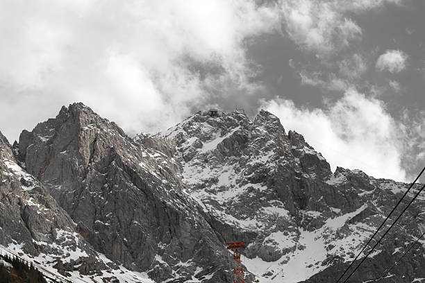 A beautiful view from the Zugspitze summit on the Alps on at spring. Bavarian Alps, Germany. Zugspitze Ski Resort. Spring in the Bavarian Alps.