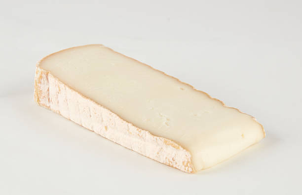 istock White butter cheese slices isolated nature background with clipping path 2211447381