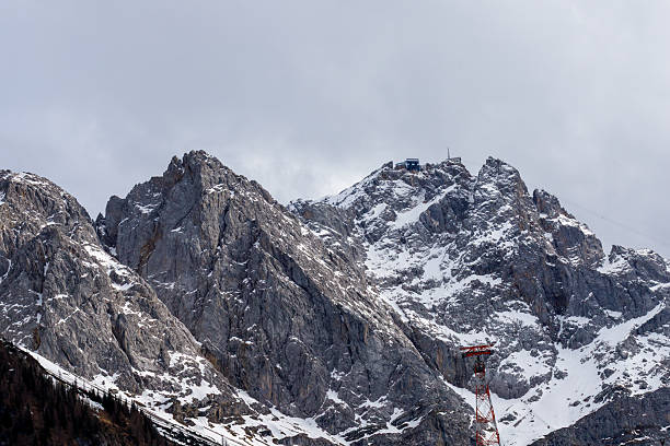 A beautiful view from the Zugspitze summit on the Alps on at spring. Bavarian Alps, Germany. Zugspitze Ski Resort. Spring in the Bavarian Alps.